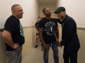 Tito Malave, Anthony Hill and Mahu Mendoza joke with eachother backstage of Extreme Combat Challenge in Muncie, Ind., on Saturday, Apr. 15, 2017. Photo by Lucas Carter.